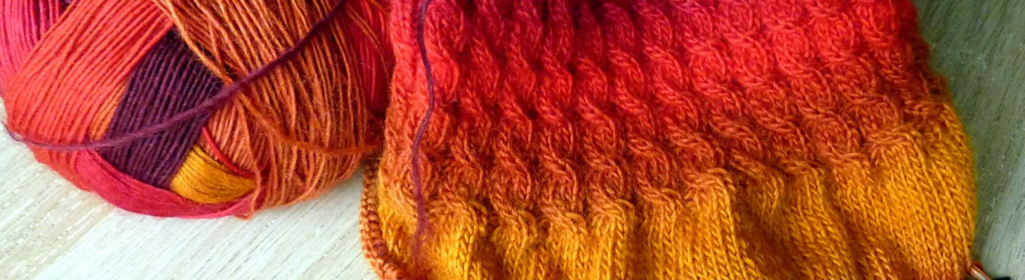Pletená podzimní čepice Zauberball